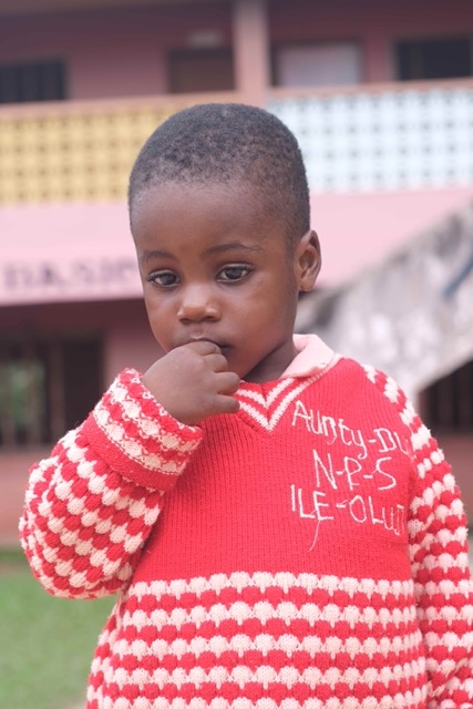 Student in school sweater
